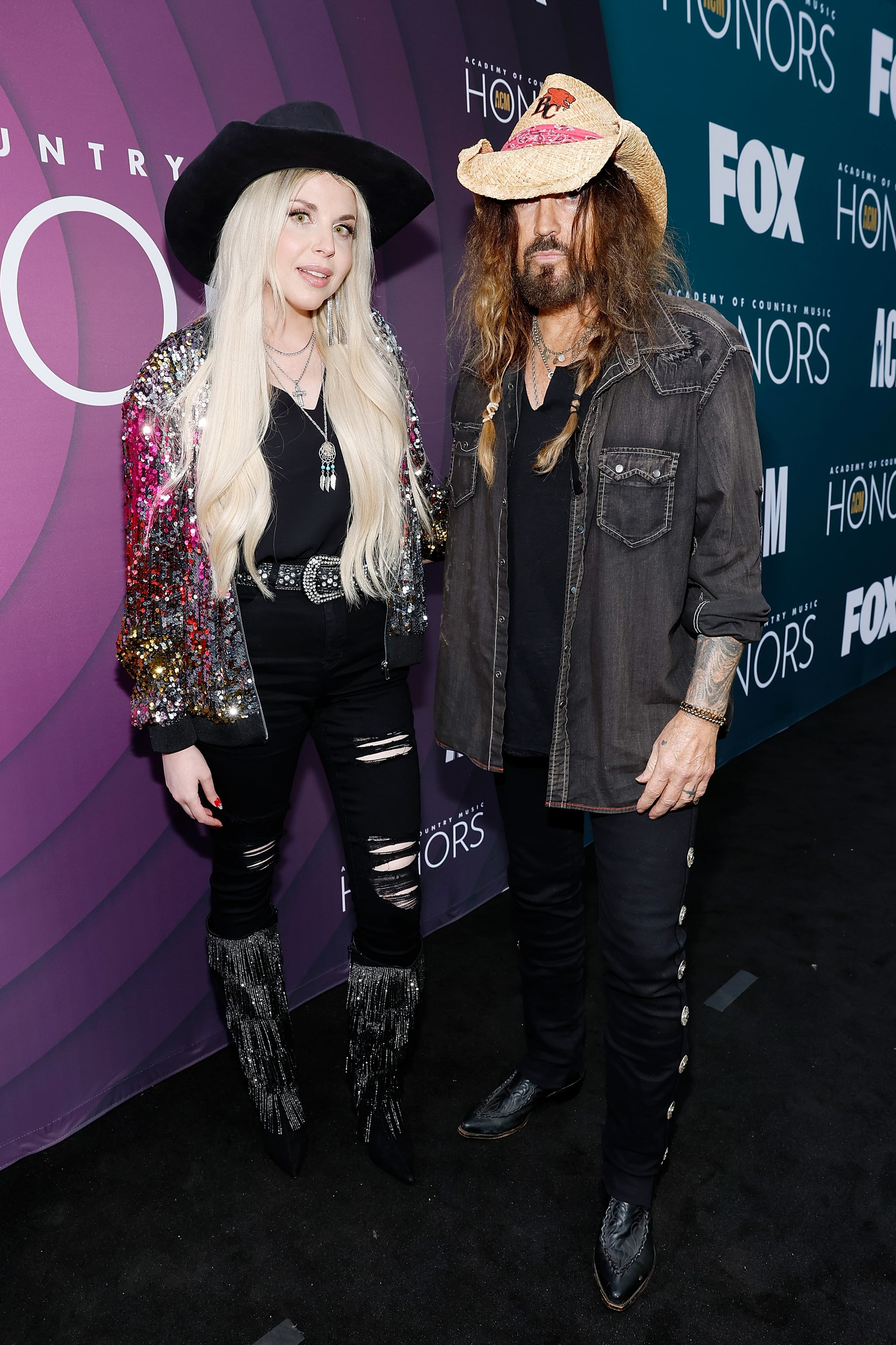 NASHVILLE, TENNESSEE - AUGUST 23: (L-R) FIREROSE and Billy Ray Cyrus attend the 16th Annual Academy of Country Music Honours at Ryman Auditorium on August 23, 2023 in Nashville, Tennessee. (Photo by Jason Kempin/Getty Images for ACM)