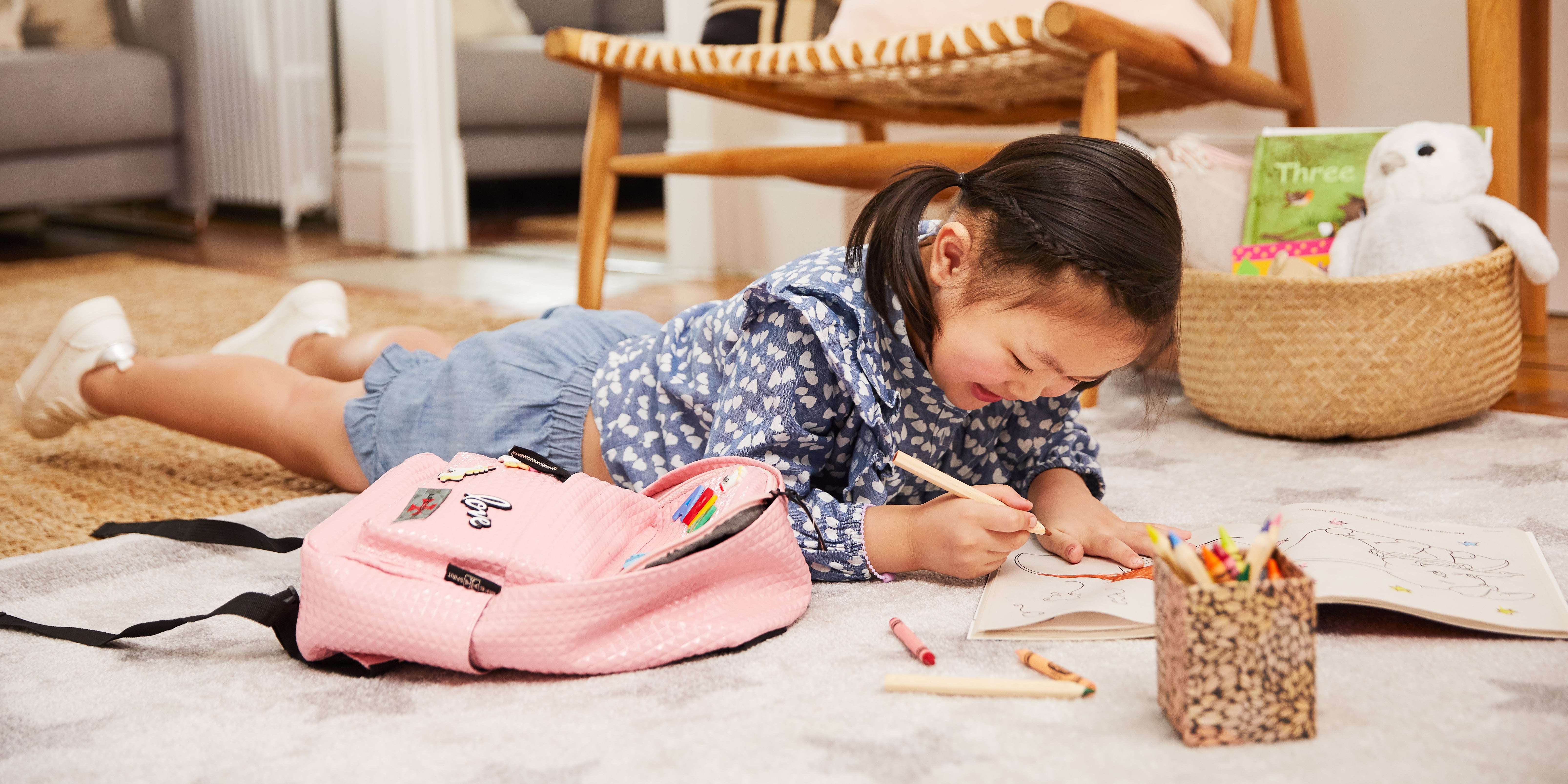 Little girls shop playing with toys