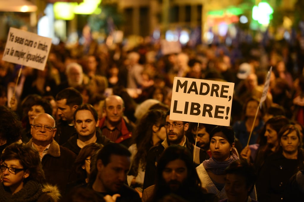 A woman held up a sign reading, "Free Mother," during a Madrid demonstration.