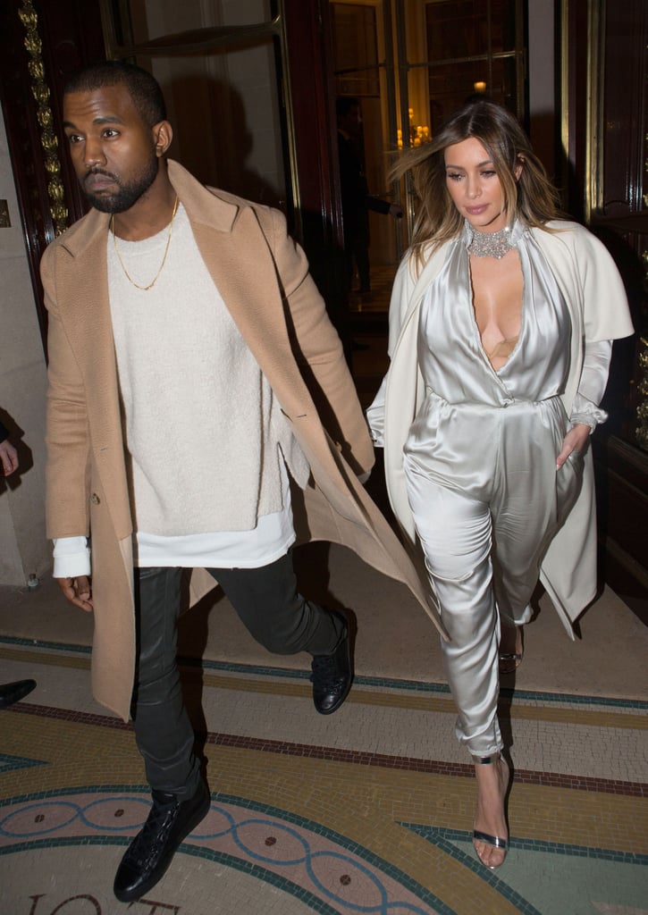 Kim Kardashian and her fiancé, Kanye West, walked hand in hand in Paris on Monday.