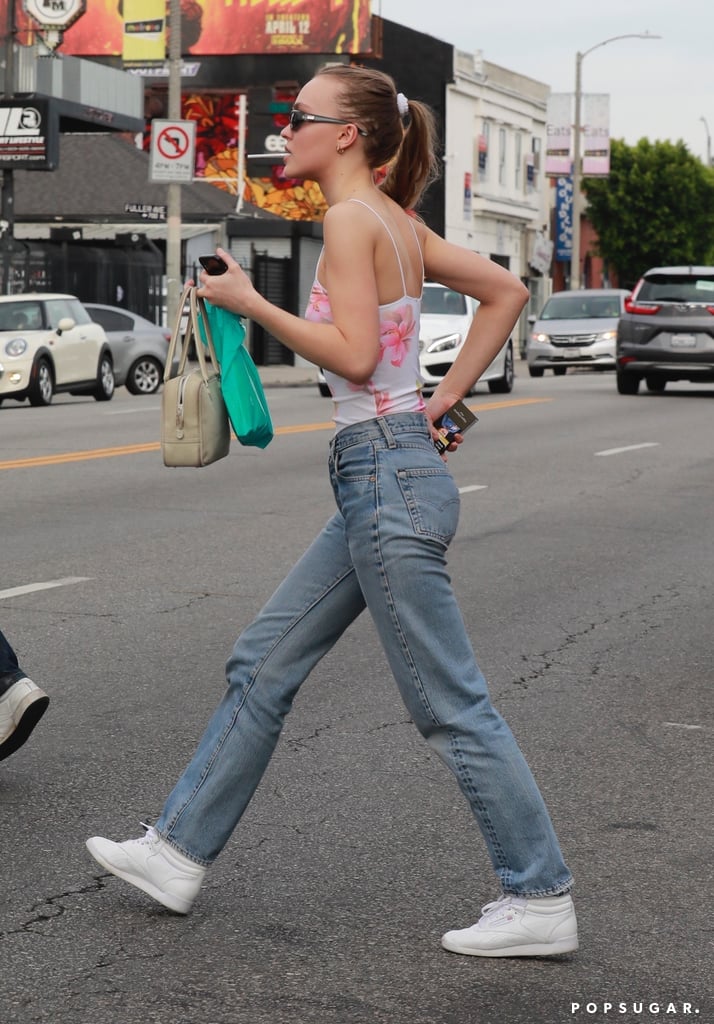 Lily-Rose Depp Jeans and Floral Bodysuit