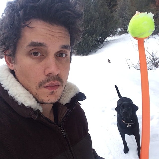 John Mayer played fetch with his dog in the snow.
Source: Instagram user johnmayer