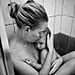 Photo of a Mother Caring For Her Sick Baby Taken by Her Son