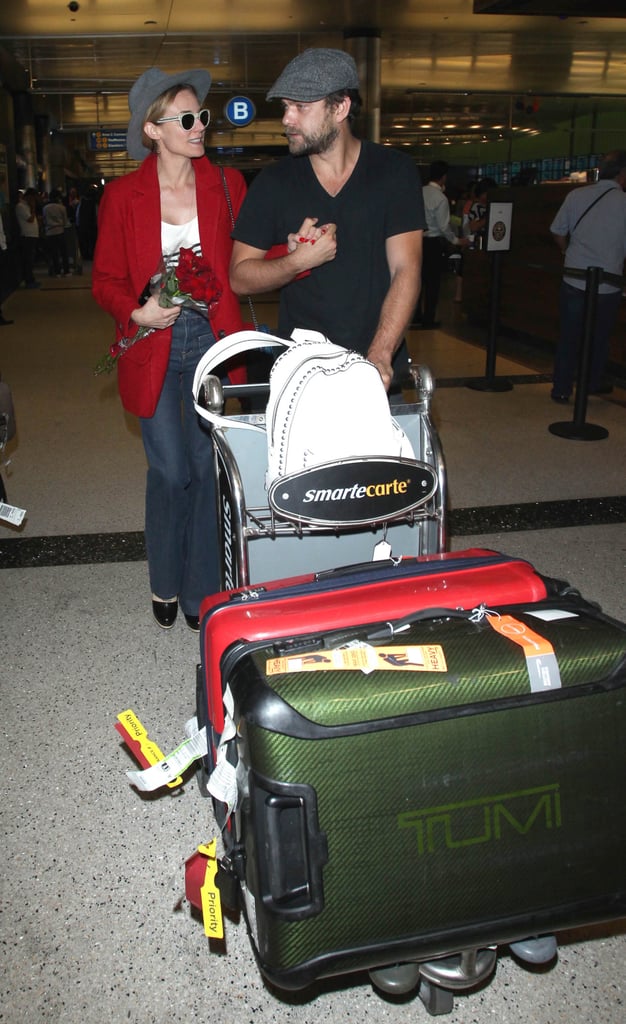 Joshua Jackson Brings Diane Kruger Roses at LAX