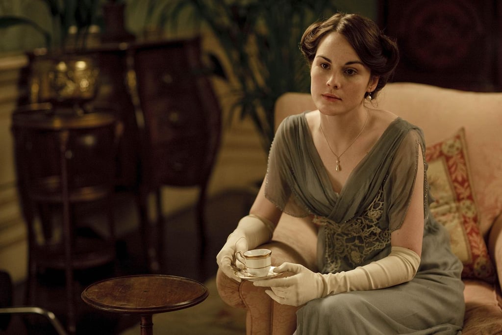 Ever notice how nobody wears her hair down at Downton Abbey in the earlier seasons? That's not by accident. Only little girls and "loose" women wore their hair down in those days. Wearing hair up, however, showed that she was ready to be presented — and therefore, courted — as a grown woman.
Source: ITV