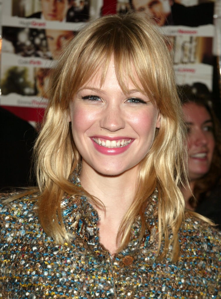 Amid a slew of British actors like Hugh Grant and Emma Thompson, American actress January Jones made an appearance in the 2003 film Love Actually. At the New York premiere, January showed off her signature blond hair with natural waves and bangs, and her makeup was natural with rosy cheeks and a pink pout.