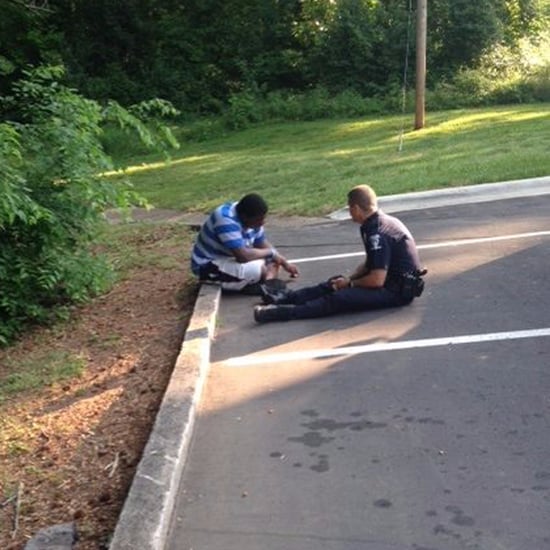Officer Sits With Boy With Autism