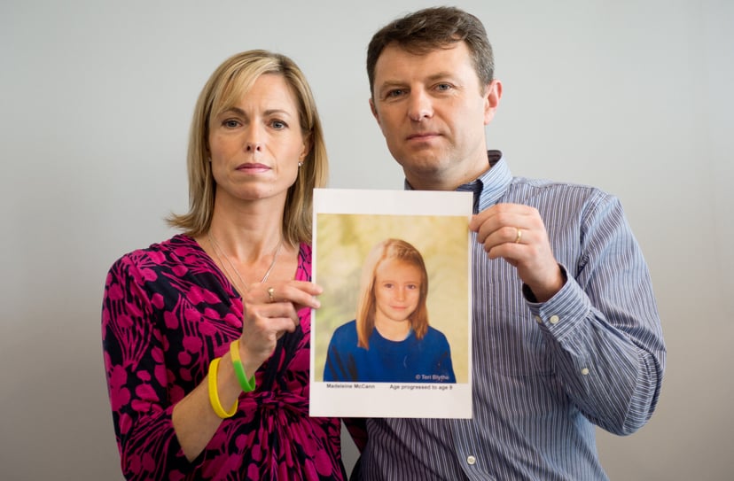 Parents of missing girl Madeleine McCann, Kate (L) and Gerry McCann (R) pose with an artist's impression of how their daughter might look now at the age of nine ahead of a press conference in central London on May 2, 2012 five years after Madeleine's disa