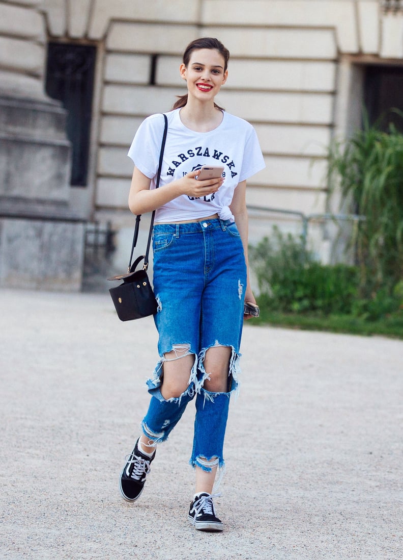 With Distressed Jeans and a Graphic Tee