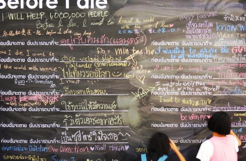 A palliative care organization teamed with a local hospice to post this wall in Bangkok, Thailand, last year outside one of the city's biggest malls to help people peacefully reflect on the end of life.  
Photo courtesy of BeforeIDie.com