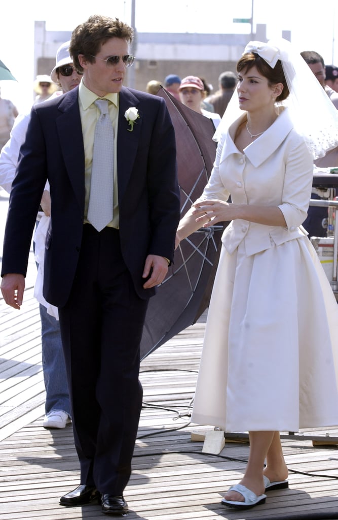 George's wedding outfit doesn't look that different than his usual getup, but Lucy looks wonderful.