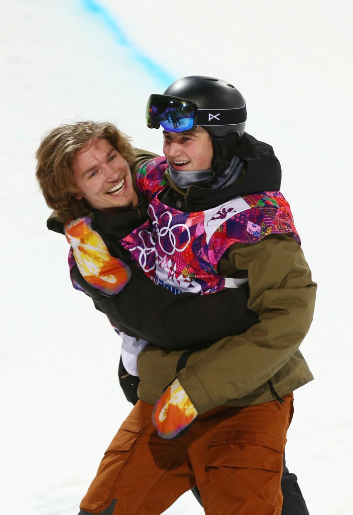Switzerland's Iouri Podladtchikov and David Habluetzel hugged after competing in the snowboard men's half-pipe finals.