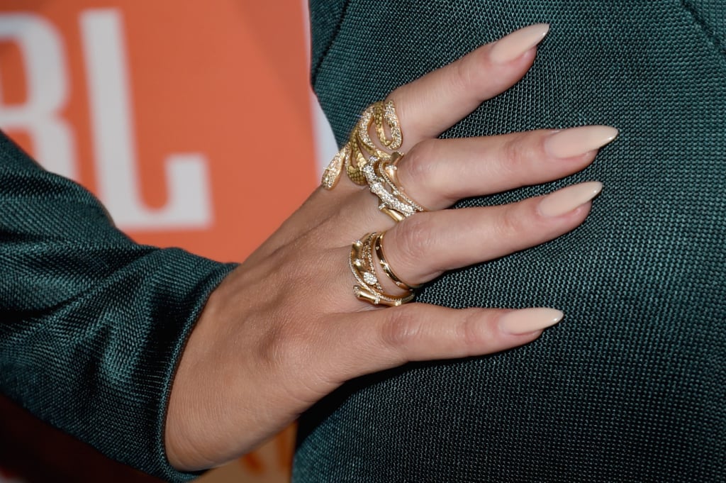 Chrissy Teigen Wearing a Teal Dress at Pre-Grammys Party