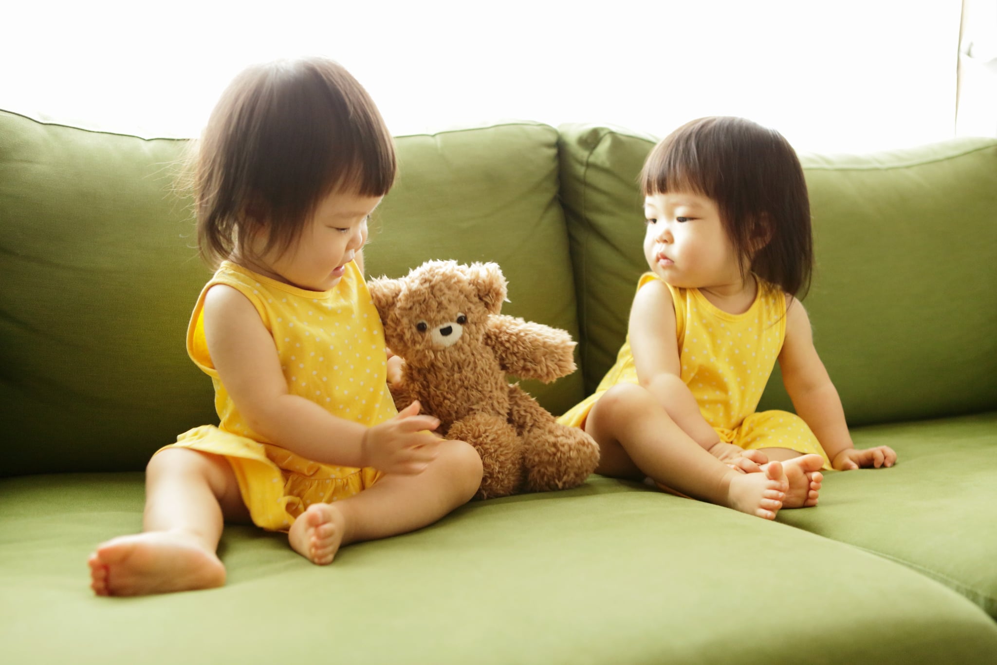 Two girls in matching dresses