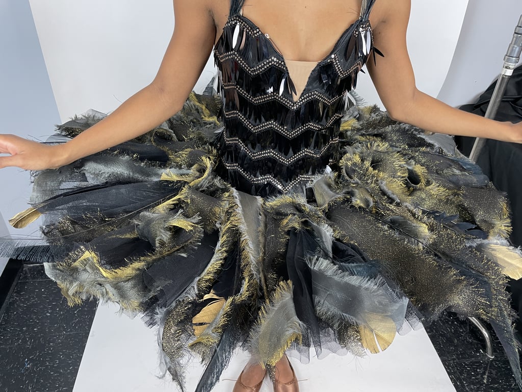 Faran's Black Swan costume was designed and constructed entirely by the wardrobe team. "I've never designed ballet, so it was a unique challenge," Evans says. "The costume is creepy, yet beautiful, incorporating high-shine paillettes, hand-shredded fabrics in different tones and textures, and real feathers."