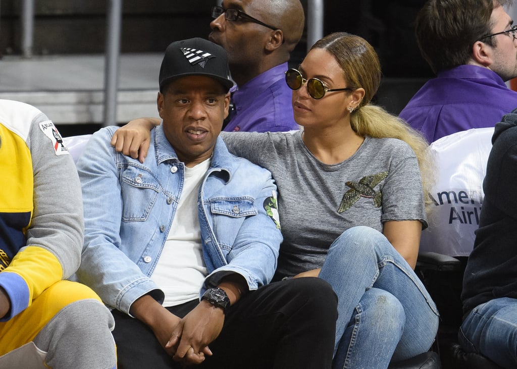 Bey slung her arm around her man as they sat courtside for the Brooklyn Nets and LA Lakers game in February 2016.