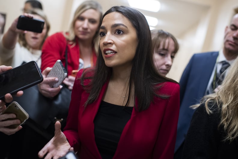 UNITED STATES - FEBRUARY 06: Rep. Alexandria Ocasio-Cortez, D-N.Y., talks with reporters after a news conference in the Capitol with Rep. Andy Levin, D-Mich.,  on the 