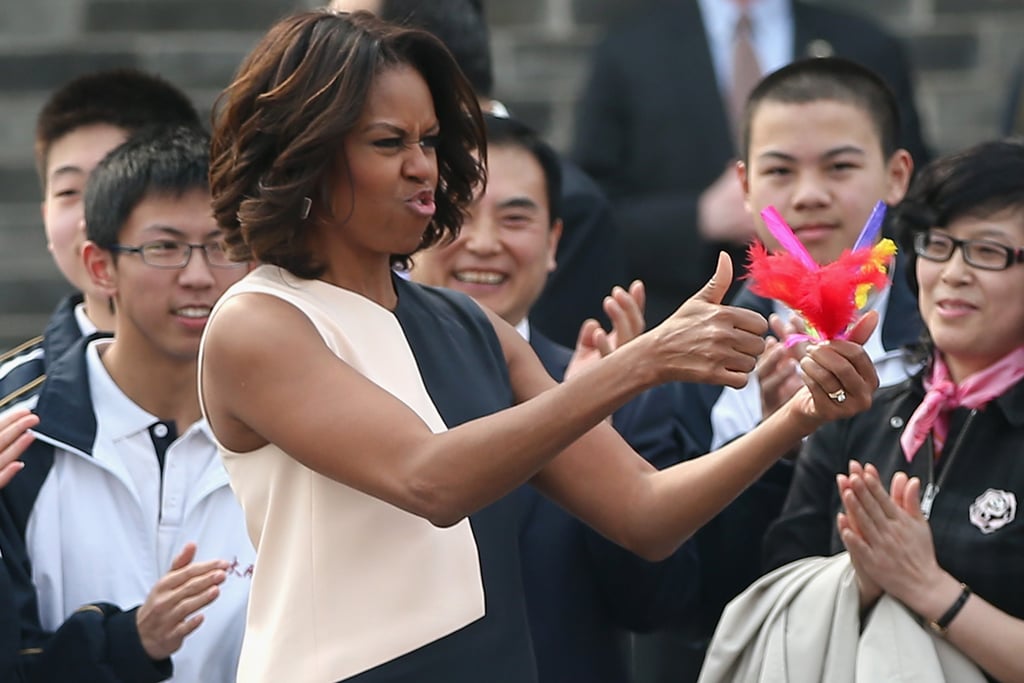 The first lady gave two thumbs-up while visiting Xi'an with her mom and daughters.