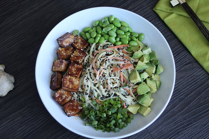 Spiralized Vegetable Tahini Bowl With Tofu, Edamame, and Avocado