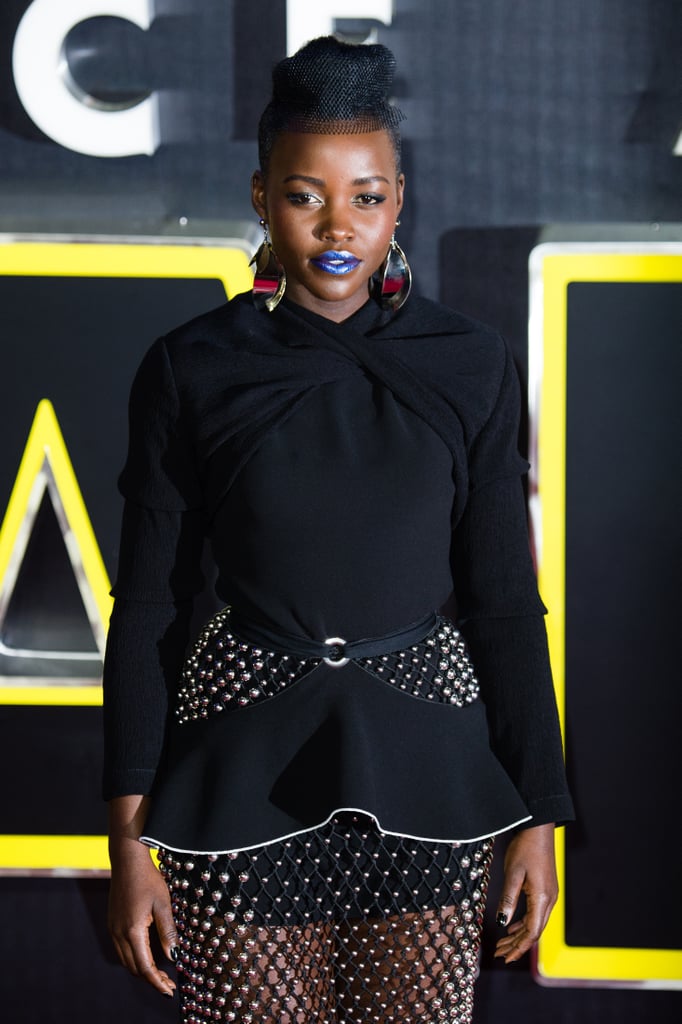There were silver chain details throughout the look, even on Lupita's belt.