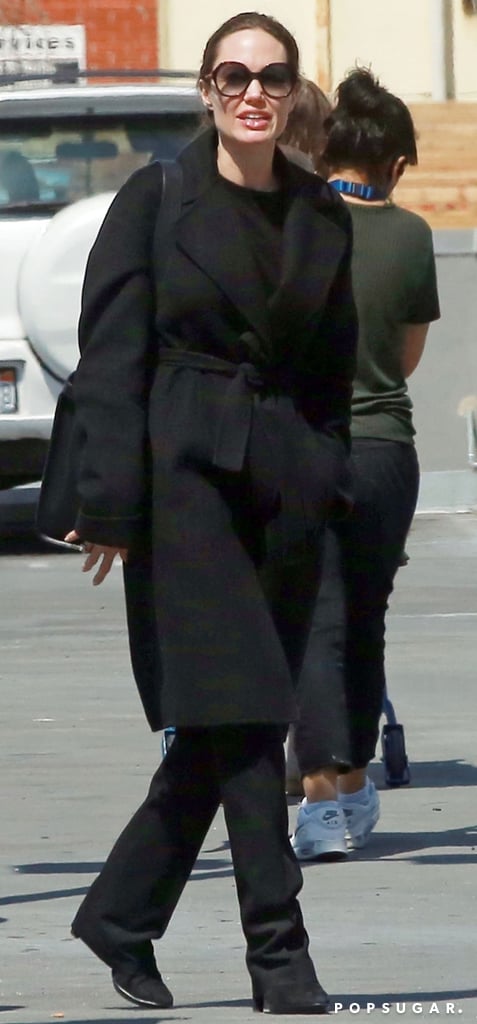 Angelina Jolie Wearing Black Trousers