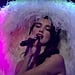 Dua Lipa Wore a Giant Feathered Hat While Performing on SNL