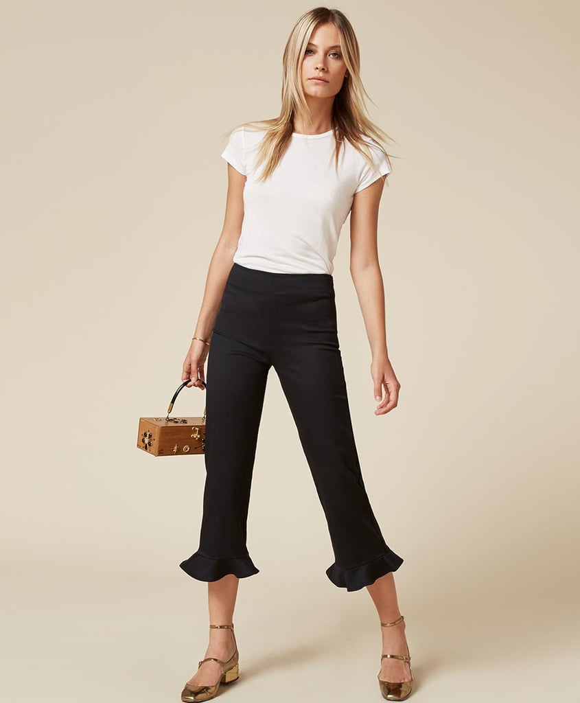 "You can tell me the Reformation Mesa pant ($178) is boring, but just check out that frill at the bottom. In a flattering black shade, I can already tell the high-waist silhouette will give my booty a boost. Plus, these are cropped perfectly for my petite frame." — SW