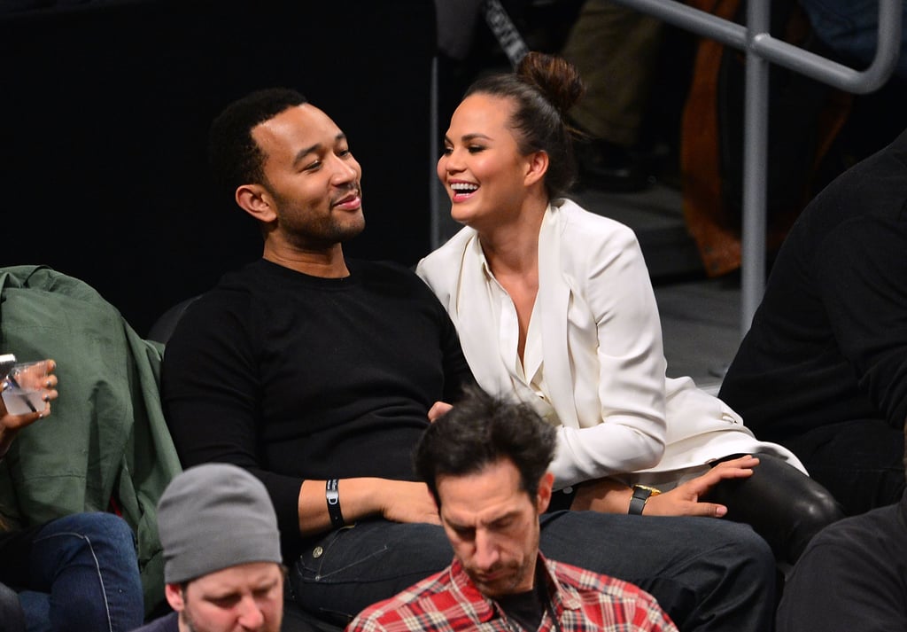 John Legend and Chrissy Teigen looked cute in the stands while watching the Lakers play the Brooklyn Nets in February 2013.