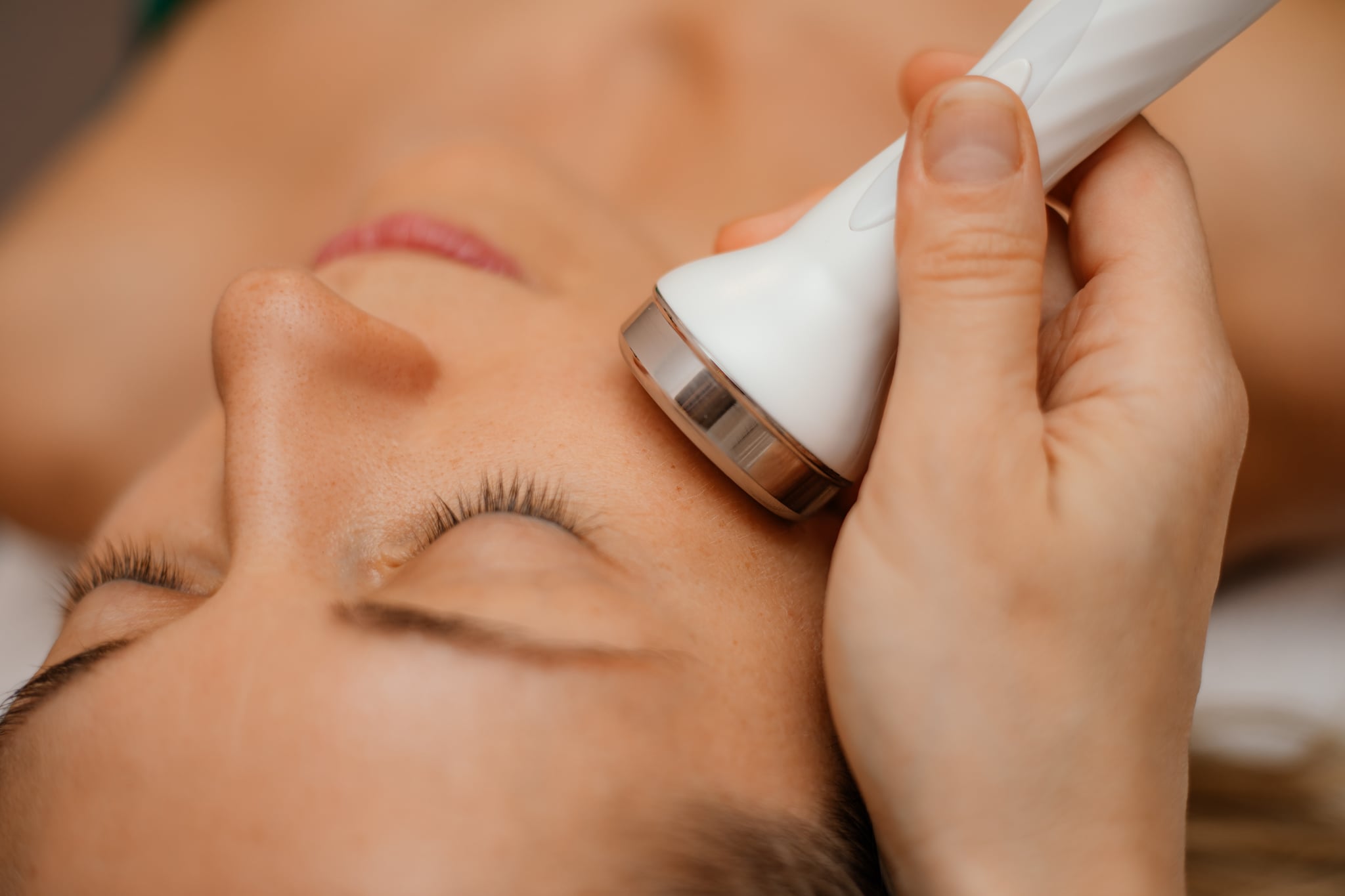 woman getting in-office skin treatment