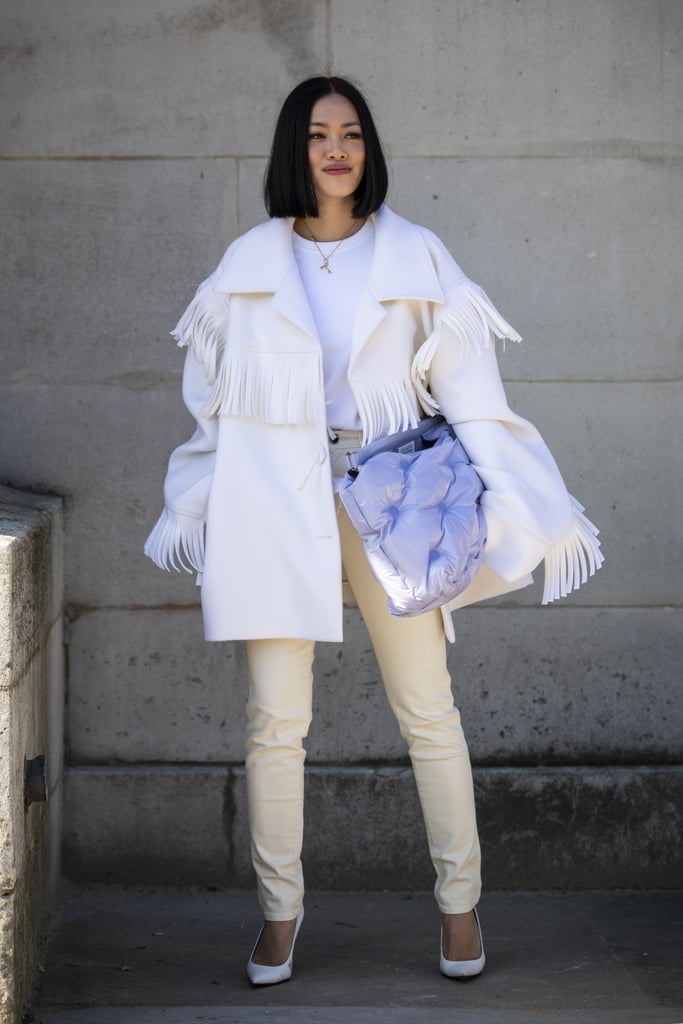 A white tee perfectly tempers exaggerated statement pieces.