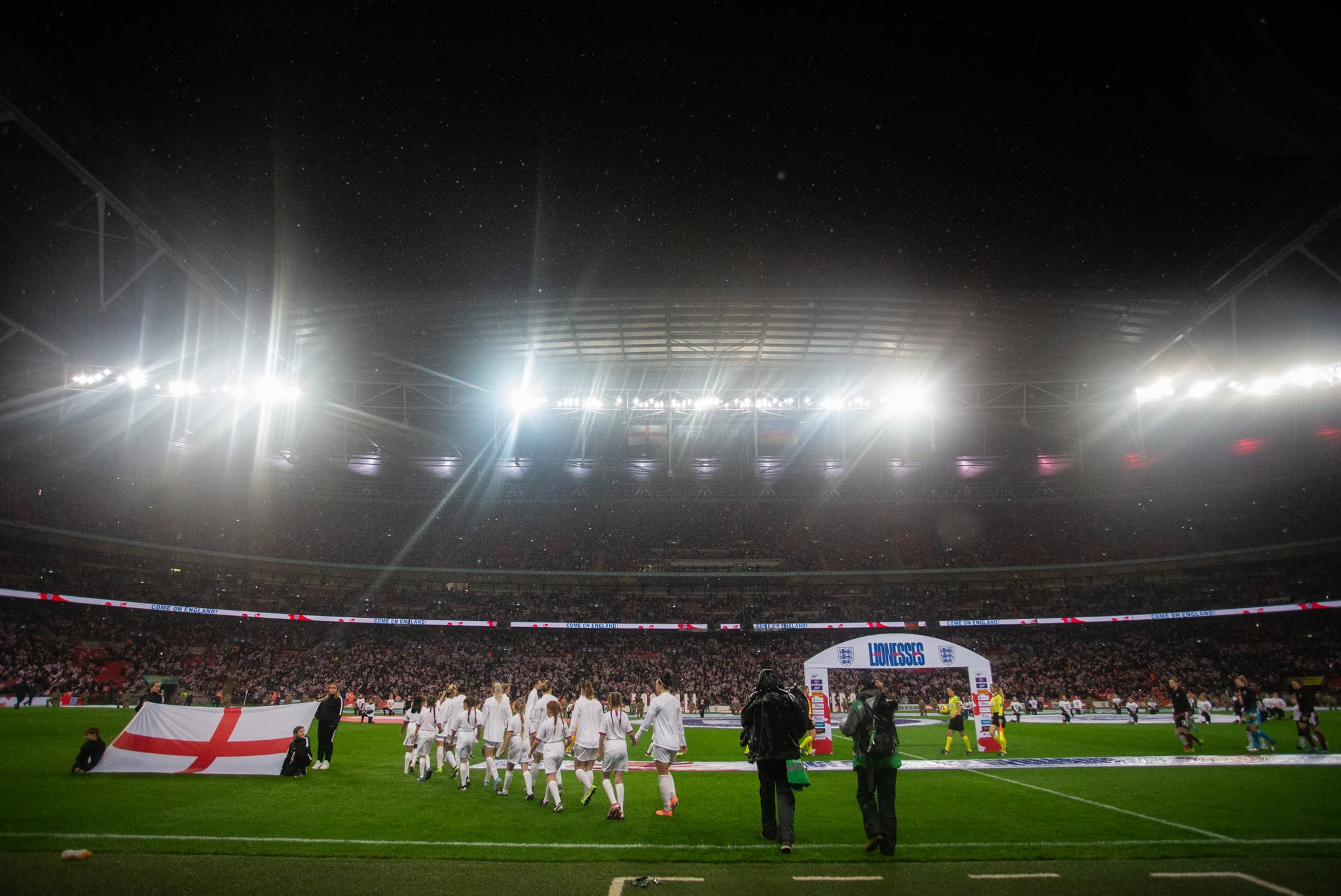 The England Team walk on to the pitch with their player escorts for the singing of the national anthems before kick-off England v Germany Women's International Friendlies football match, Wembley Stadium, London, UK - 09 Nov 2019Photo: Chloe Knott for The FA