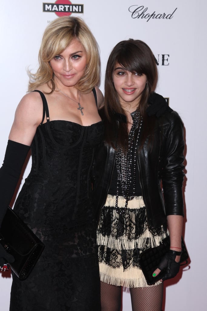 In Dolce & Gabbana with Madonna at the Nine premiere at Ziegfeld Theatre in New York City in 2009.