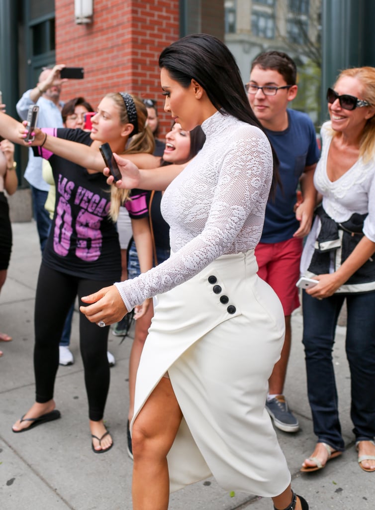 Kim Kardashian Wearing White Outfit For Book Signing 2015