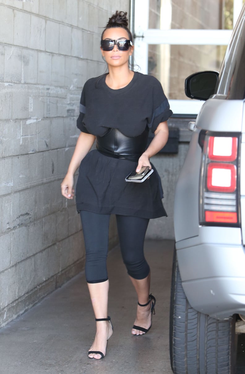 Kim Wearing an Oversize Black Tee and a Leather Belt