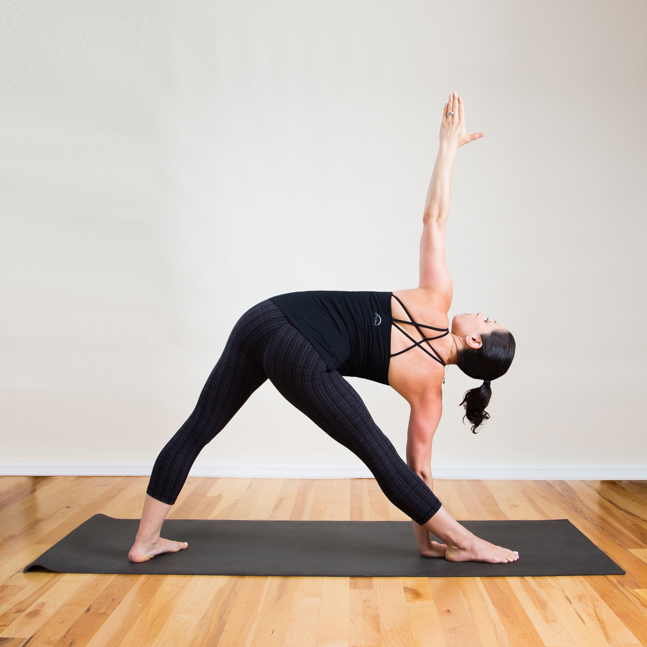 3 Yoga Poses to Eliminate Back Fat