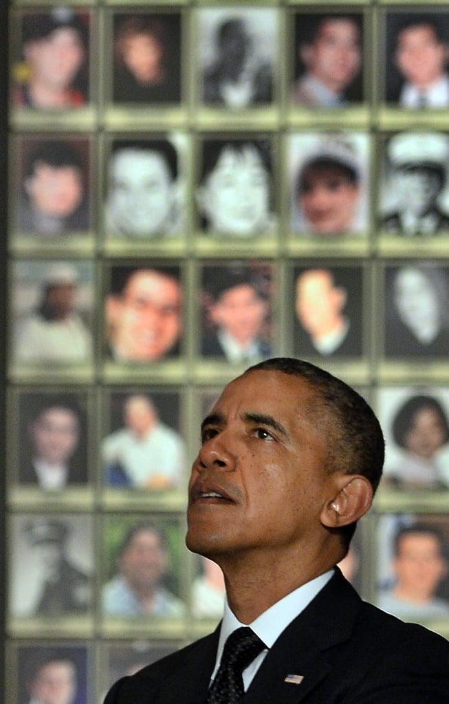 After delivering remarks at the National 9/11 Memorial & Museum's dedication ceremony, President Barack Obama looked at photos of the people whose lives were lost.