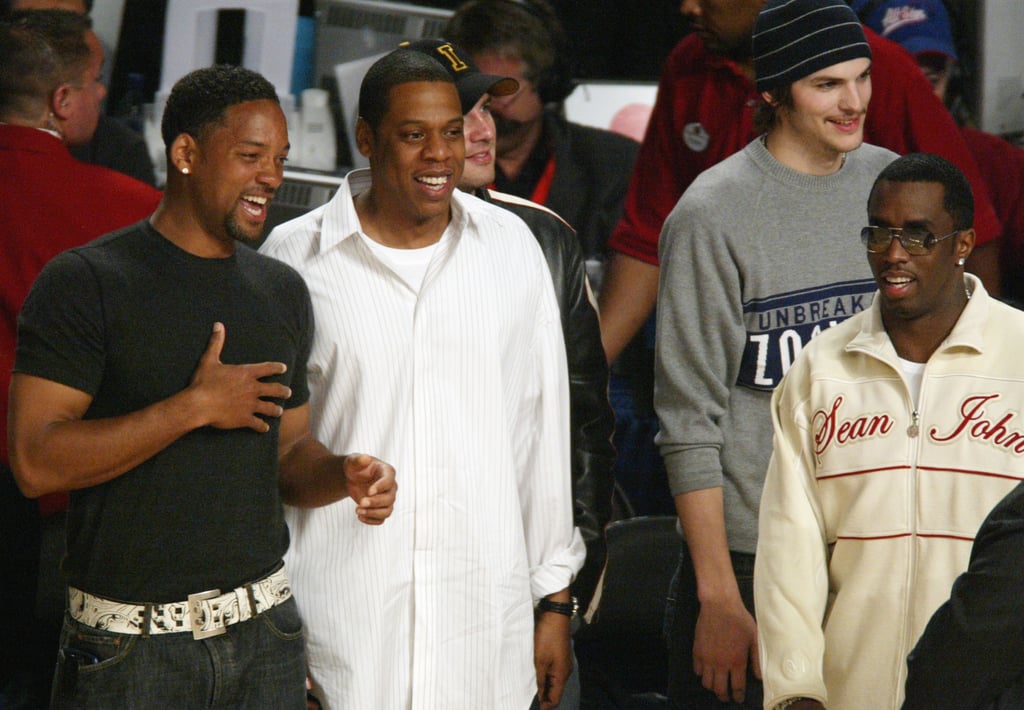 Will Smith shared a laugh with Jay Z, Diddy, and Ashton Kutcher at a game in February 2004.