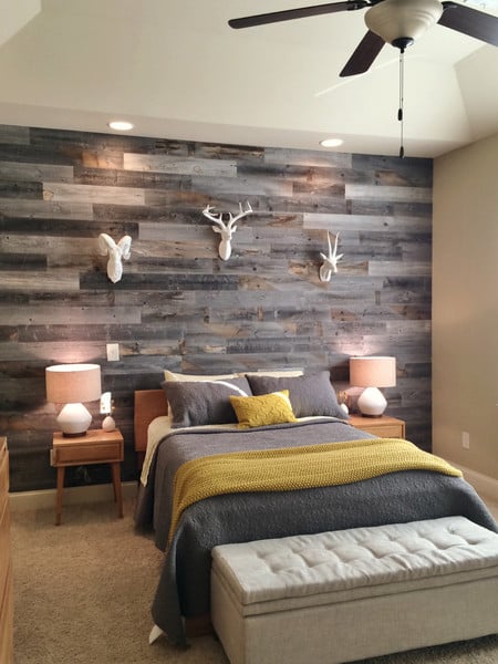 Wood planks give this bedroom a rustic, moody vibe.