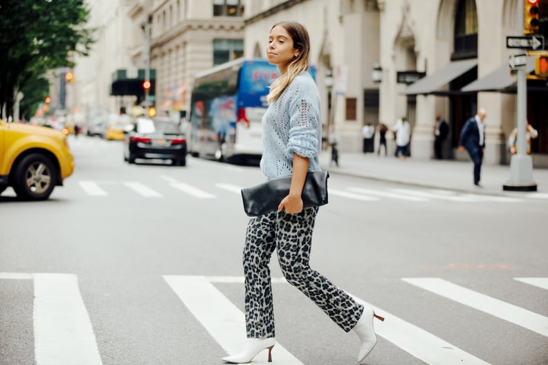Easy Outfits: A Crewneck Sweater, Printed Pants, Boots, and a Clutch