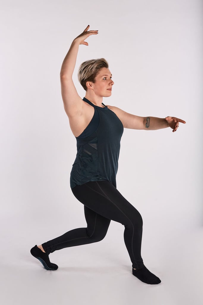 Stand with feet hips-width distance apart.
Cross your left leg behind your right, keeping your shoulders square.
Bend both knees, coming into a curtsy lunge position.
Lift your right arm overhead, with your left arm extended forwards and pulse for 60 seconds on each side.