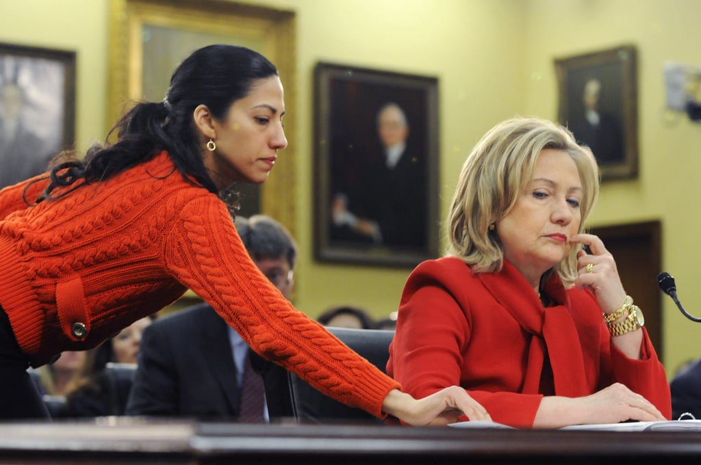 Abedin slipped Clinton a note during a heading in Congress in 2011.