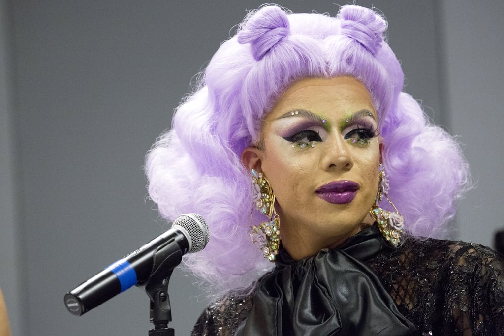 AJA spoke to the audience during DragCon with lavender locks. DragCon