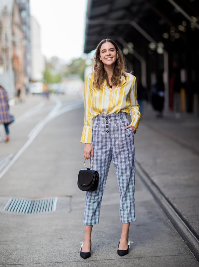 Checks and stripes were made for wearing together — just embrace bold, contrasting colors.