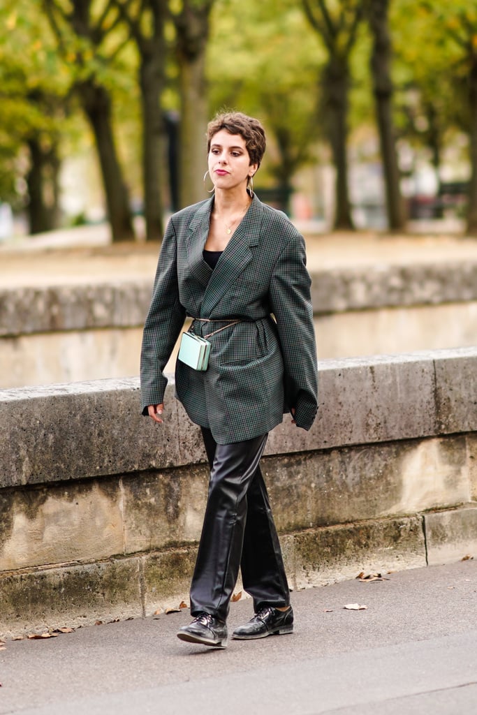 Use a bag on a chain to cinch your waist when you're wearing an oversize blazer.