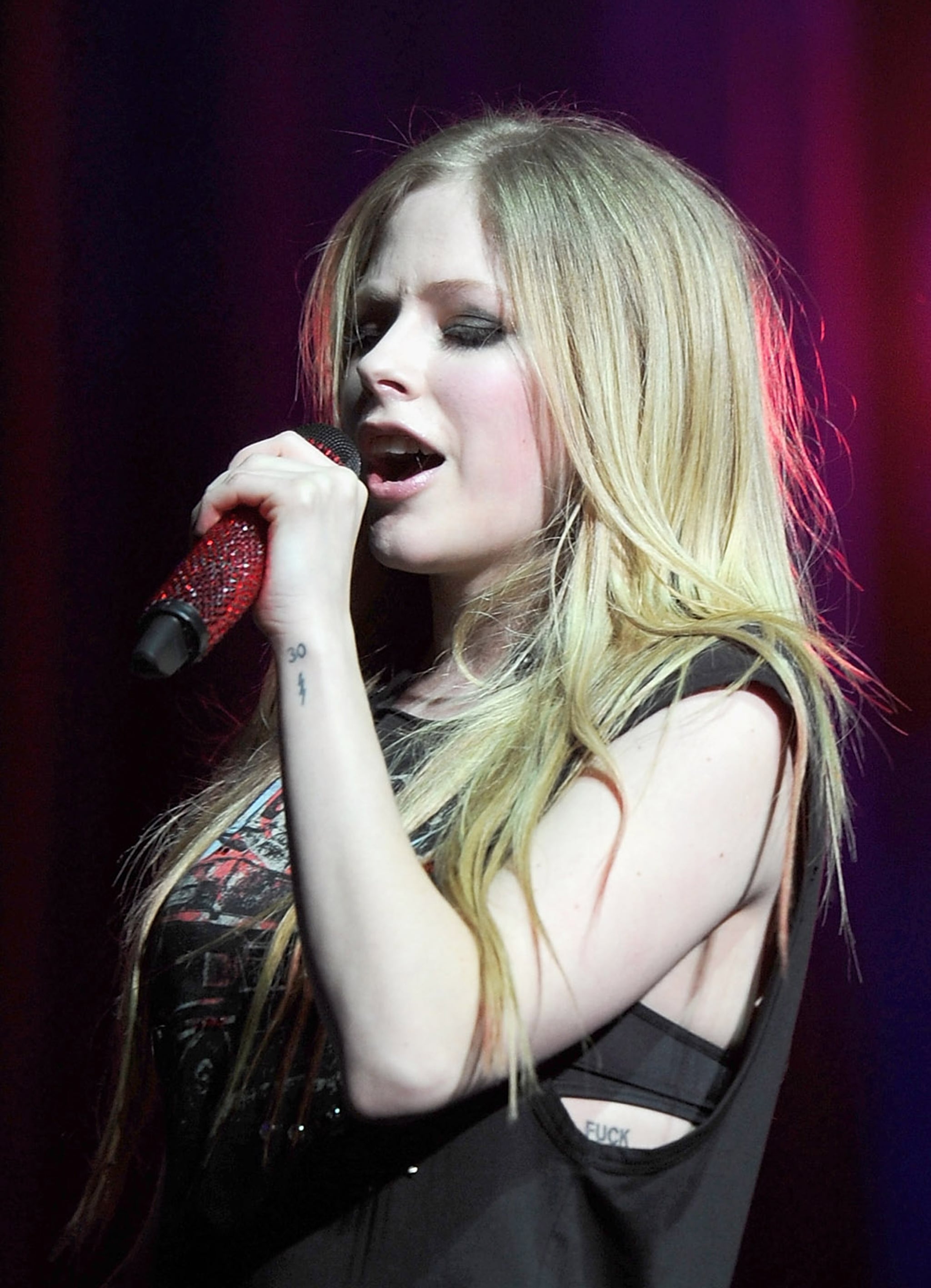 Avril Lavigne's 25+ Tattoos: A Guide