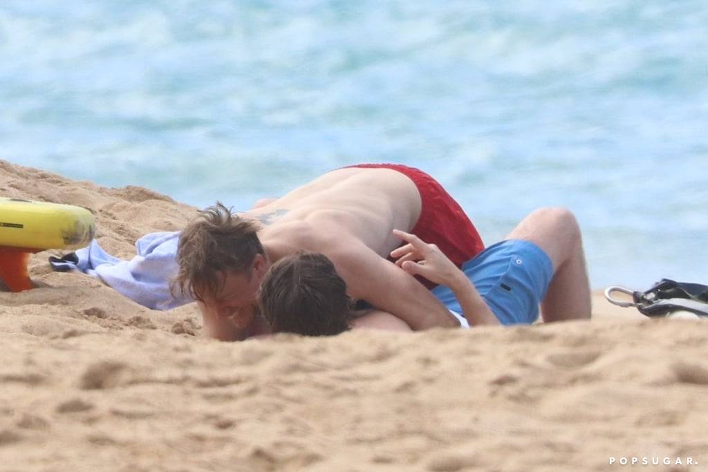 Charlie Hunnam and Garrett Hedlund Wrestle in Hawaii Photos