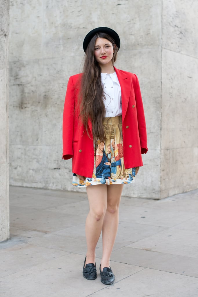 Channel your inner French-schoolgirl cuteness and go with a bold jacket, flats, and a patterned skirt. A crisp white shirt pulls it all together — that and, of course, some pretty, red lips.