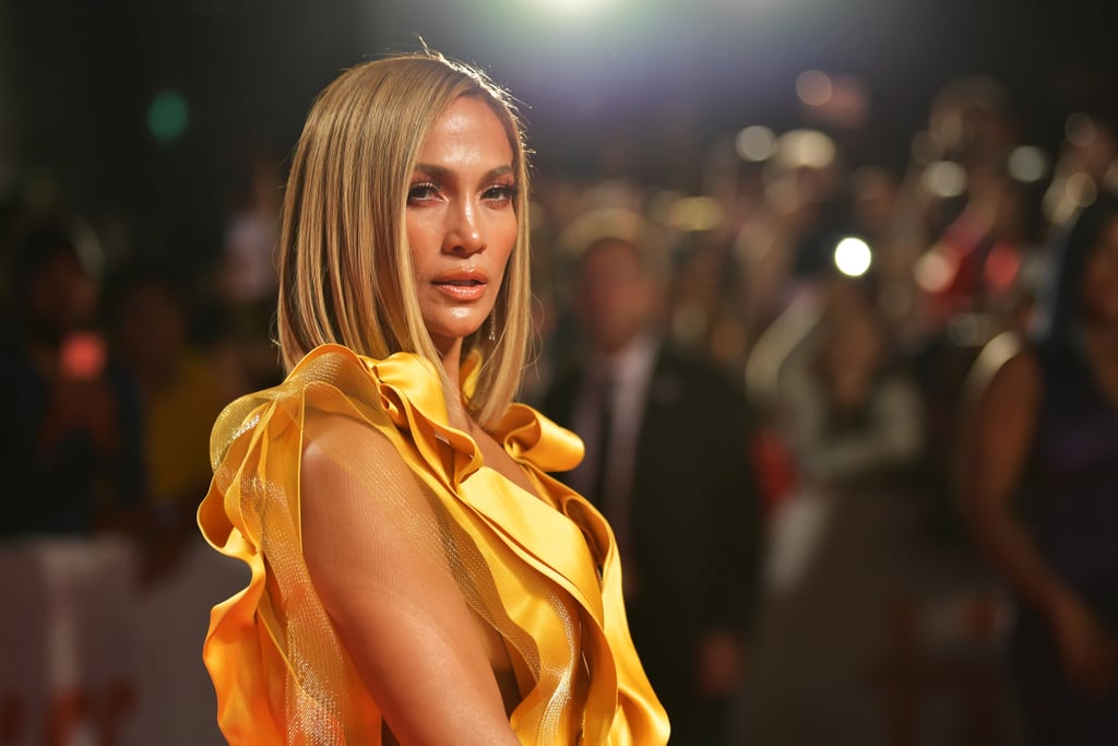 Jennifer Lopez Wears Yellow Gown to Hustlers TIFF Premiere