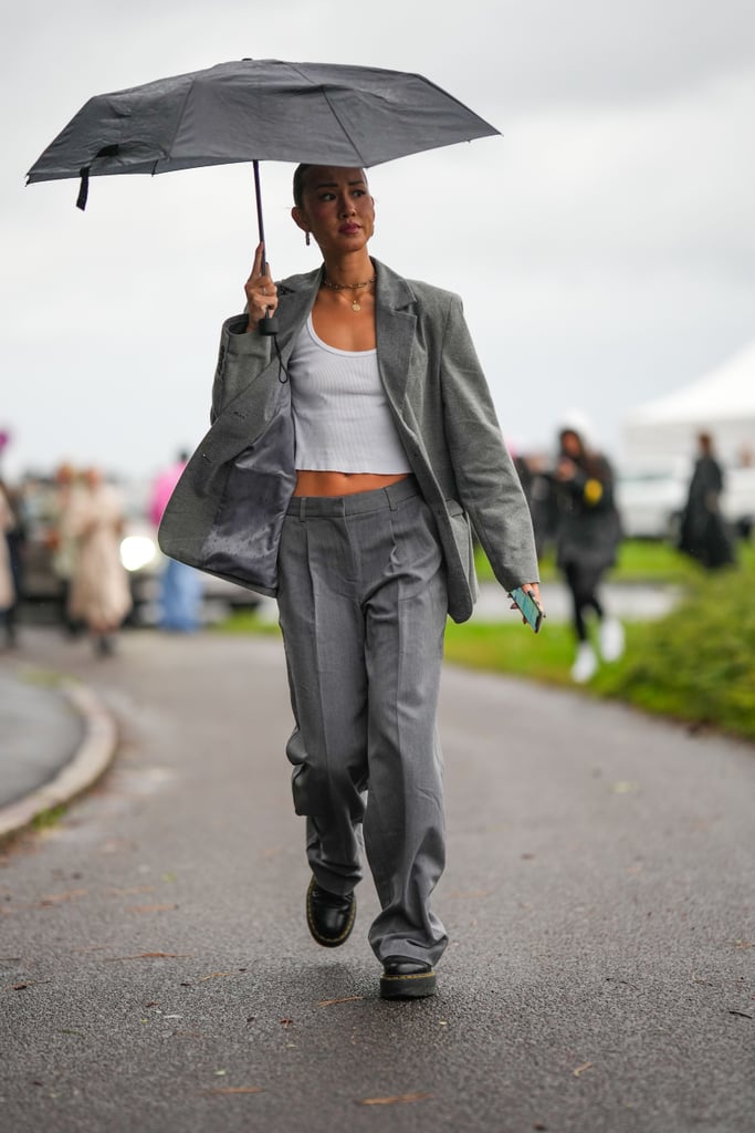 Gray Pantsuit, White Tank, and Doc Martens Shoes