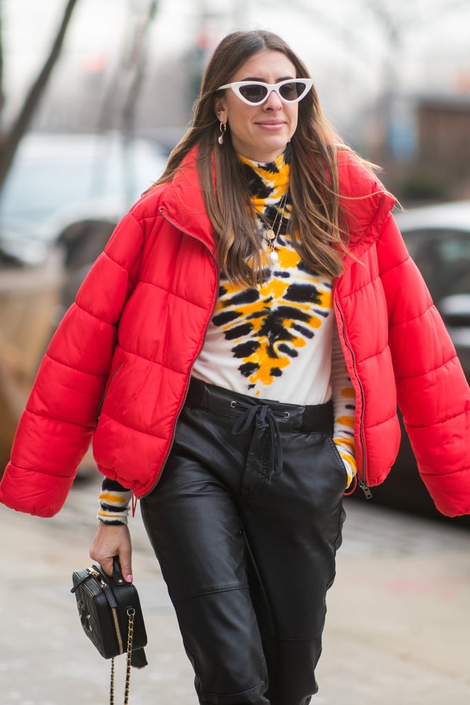 Why settle on only one colorful item when you can mix and match more than one with a tie-dye turtleneck and bright red puffer on top?